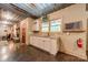 Wet bar featuring white cabinets, granite countertops, a mini fridge and view into living space at 2599 Highway 557 None, Clover, SC 29710