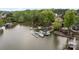 Aerial view of a lakeside community featuring boat docks and tranquil water views at 263 Fernbrook Dr, Mooresville, NC 28117