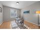 Well-lit bedroom featuring a play area and light hardwood floors, great for fun and relaxation at 263 Fernbrook Dr, Mooresville, NC 28117