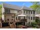 Large two-story home with deck and landscaped yard offers ample space for outdoor living and entertaining at 263 Fernbrook Dr, Mooresville, NC 28117