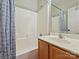 Bathroom featuring a tub/shower with white fixtures and a vanity with sink at 2731 Meadow Knoll Dr, Charlotte, NC 28269