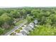 An aerial view captures homes surrounded by the vibrant beauty of nature at 2821 Shamrock Dr, Charlotte, NC 28205