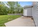 A charming backyard with a concrete patio and a fenced-in yard for outdoor enjoyment at 2821 Shamrock Dr, Charlotte, NC 28205