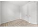 Bedroom boasts neutral carpet, light walls, and a closet at 2821 Shamrock Dr, Charlotte, NC 28205