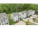 Eye-level view of modern homes with manicured lawns and inviting driveways at 2821 Shamrock Dr, Charlotte, NC 28205