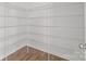 Spacious walk-in pantry with wire shelving and wood-look flooring at 2821 Shamrock Dr, Charlotte, NC 28205