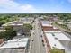 Overhead aerial shot of the town's downtown, featuring buildings and a road lined with trees at 330 Clover St, Mooresville, NC 28115