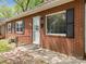 Close up of the brick home highlighting the charming entrance and well-maintained facade at 330 Clover St, Mooresville, NC 28115