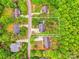 Aerial view of property showcasing landscaping, home, and lot size in a quiet, tree-lined neighborhood at 3509 Seminole Dr, Maiden, NC 28650