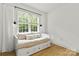 Sun-filled bedroom with a daybed, white curtains, a large window, and hardwood floors at 3509 Seminole Dr, Maiden, NC 28650