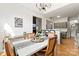 Dining room leading to the kitchen and living room with hardwood floors at 3509 Seminole Dr, Maiden, NC 28650