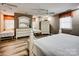 Bedroom featuring three beds, wood flooring and white furnishings at 378 Shoreline Dr, New London, NC 28127