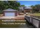 Stunning waterfront home with brick boathouse and double garage, featuring 4 beds and 3.5 baths at 378 Shoreline Dr, New London, NC 28127