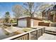 Detached garage with boat ramp access, enhancing waterfront lifestyle and convenience for boating enthusiasts at 378 Shoreline Dr, New London, NC 28127