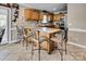 Kitchen island with granite countertop and seating, complemented by custom wood cabinetry at 378 Shoreline Dr, New London, NC 28127