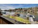 Scenic waterfront view of Lake Norman with private docks and lush landscaping, offering serene lakeside living at 378 Shoreline Dr, New London, NC 28127