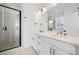 Contemporary bathroom with double vanity, stylish fixtures, a glass-enclosed shower, and a neutral color palette at 433 Blairhill Rd # 08, Charlotte, NC 28217