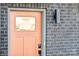 Close up of front door with a window and number 433 on a modern brick building at 433 Blairhill Rd # 08, Charlotte, NC 28217