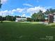 Expansive backyard with well-maintained lawn, barn, and plenty of space for outdoor activities at 4330 Goodman Lake Rd, Salisbury, NC 28146