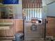 Sturdy goat pen with metal fencing and shelter, perfect for small livestock at 4330 Goodman Lake Rd, Salisbury, NC 28146