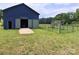 Large barn featuring an open door, fenced area, and storage at 4330 Goodman Lake Rd, Salisbury, NC 28146