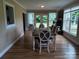 Bright dining room with a table set for six and natural light at 4330 Goodman Lake Rd, Salisbury, NC 28146