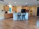 Bright kitchen with modern cabinetry, white breakfast bar, and hardwood floors at 4330 Goodman Lake Rd, Salisbury, NC 28146