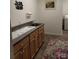 Functional laundry room with a sink, cabinets, and washer and dryer hookup at 4330 Goodman Lake Rd, Salisbury, NC 28146