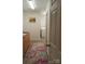 Bright laundry room features a sink, storage, and access to the washing machine at 4330 Goodman Lake Rd, Salisbury, NC 28146