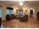 Comfortable living room with built-in bench, hardwood floors and natural light at 4330 Goodman Lake Rd, Salisbury, NC 28146
