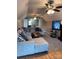 Cozy living room featuring a large sectional sofa, ceiling fans, and television at 4330 Goodman Lake Rd, Salisbury, NC 28146