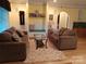 Cozy living room with plush seating, built-in shelves, and ambient lighting at 4330 Goodman Lake Rd, Salisbury, NC 28146