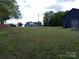 Idyllic property showcasing a charming home, garage, and spacious lawn at 4330 Goodman Lake Rd, Salisbury, NC 28146