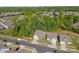 Overview showing homes, lots of trees in the background, and street access at 4607 Walking Path Dr, Waxhaw, NC 28173