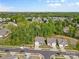 Scenic aerial view featuring neighborhood homes, lush green trees, and streetscapes at 4607 Walking Path Dr, Waxhaw, NC 28173