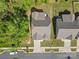 Aerial view of a well-maintained home with a large backyard, patio, and proximity to trees at 4607 Walking Path Dr, Waxhaw, NC 28173