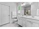 Bright bathroom with a double vanity, ample lighting, and a clean, modern aesthetic at 4607 Walking Path Dr, Waxhaw, NC 28173
