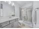 Updated bathroom with glass shower doors, a single vanity, and tile flooring at 5028 Whitemarsh Ct, Indian Land, SC 29720
