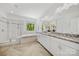 Modern bathroom with double sink vanity, soaking tub and glass enclosed shower at 5028 Whitemarsh Ct, Indian Land, SC 29720
