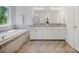 Well-lit bathroom with a soaking tub, double vanity, granite countertop and modern fixtures at 5028 Whitemarsh Ct, Indian Land, SC 29720