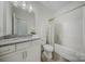 Well-appointed bathroom featuring a granite countertop vanity, bathtub, and shower combination at 5028 Whitemarsh Ct, Indian Land, SC 29720