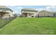 Spacious backyard featuring a well-maintained lawn and outdoor seating area perfect for entertaining at 5037 Nighthawk Dr, Fort Mill, SC 29707