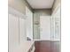 Inviting entryway with coat rack and bench, leading to the living spaces through the front door at 5037 Nighthawk Dr, Fort Mill, SC 29707