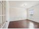 Bright living room with hardwood floors, chair railing, crown molding, and a window allowing natural light at 5037 Nighthawk Dr, Fort Mill, SC 29707