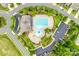 Aerial view of the community pool, playground, clubhouse, and parking at 5050 Kinross Ln, Indian Land, SC 29707