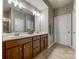 Bathroom featuring double sink vanity with tile flooring and private water closet at 5050 Kinross Ln, Indian Land, SC 29707