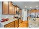 Well-equipped kitchen with granite countertops, stainless steel appliances, and ample storage at 5050 Kinross Ln, Indian Land, SC 29707