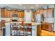 Modern kitchen featuring granite countertops, stainless steel appliances, and a central island at 5050 Kinross Ln, Indian Land, SC 29707