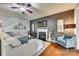 Comfortable living room featuring a fireplace, ceiling fan, and stylish decor at 5050 Kinross Ln, Indian Land, SC 29707