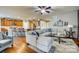 Open-concept living space with comfortable seating and a view of the modern kitchen at 5050 Kinross Ln, Indian Land, SC 29707